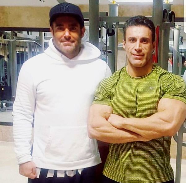رضا گلزار در کنار مربی بدنسازی اش + عکس